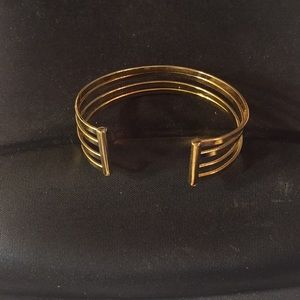 Adjustable gold tone bracelet